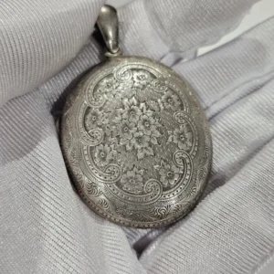 Antique Oval silver locket very intricate 19 century